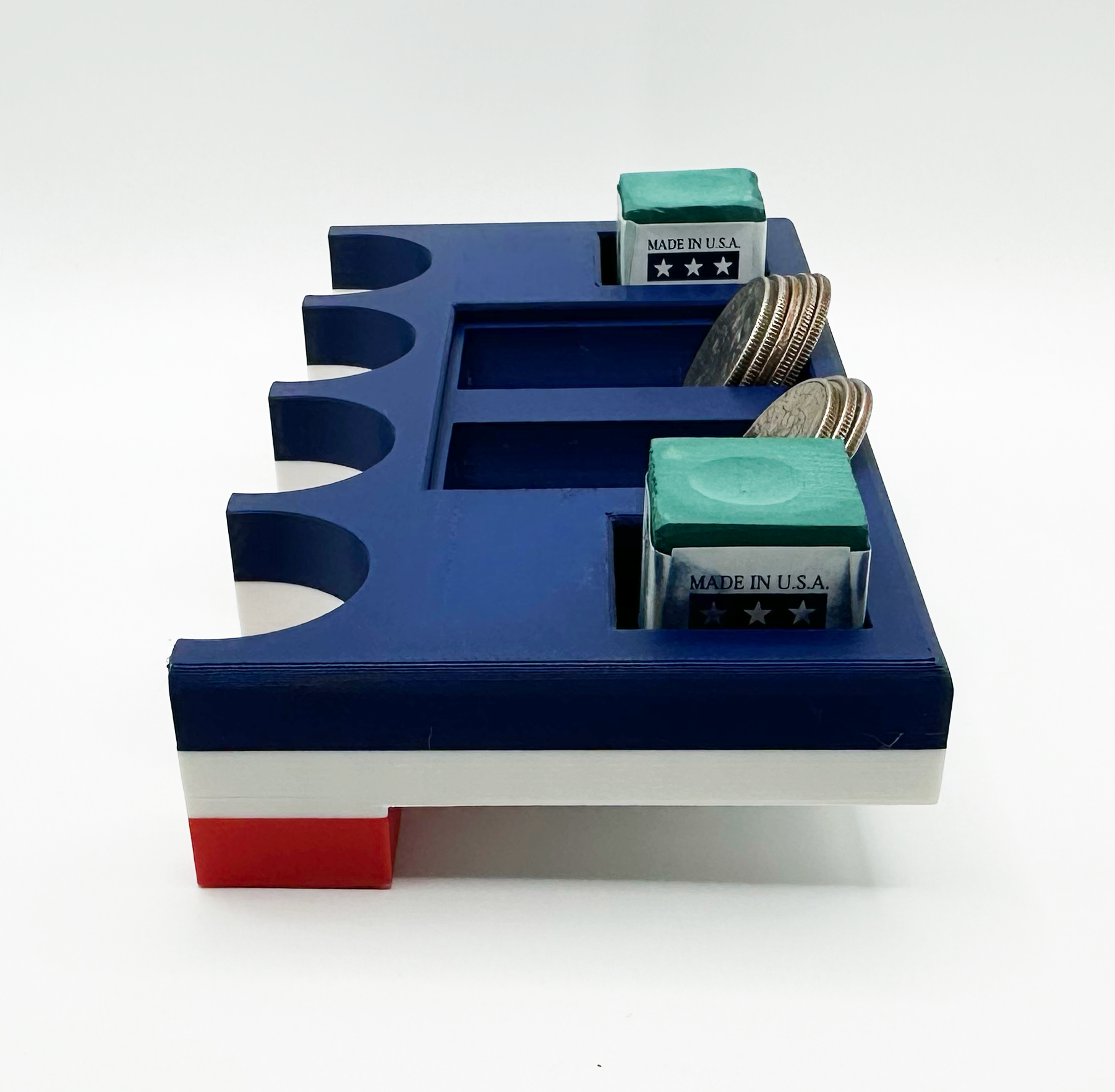 Side view of table top pool stick holder with american flag design with chalk and quarter holders